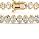 14.00 ctw Bezel-Set Lab Created Oval Sapphire Tennis Bracelet in 14K Yellow Gold Overlay