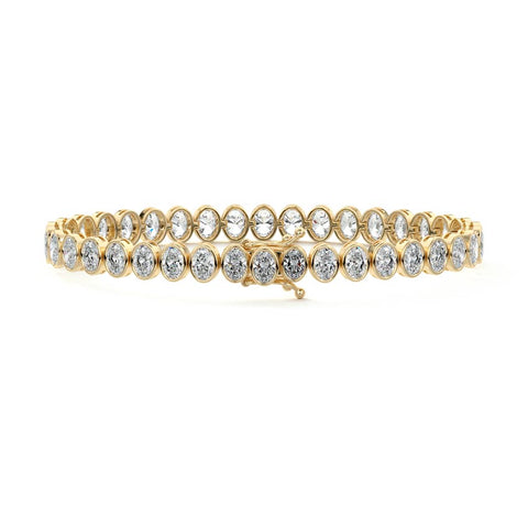 14.00 CTW Bezel-Set Lab Created Oval Sapphire Tennis Bracelet in 14K Yellow Gold Overlay
