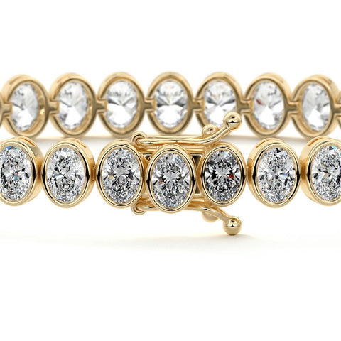 14.00 CTW Bezel-Set Lab Created Oval Sapphire Tennis Bracelet in 14K Yellow Gold Overlay