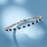 6ctw Created White & Blue Sapphire Tennis Bracelet in 14K Gold Overlay – 7.25”